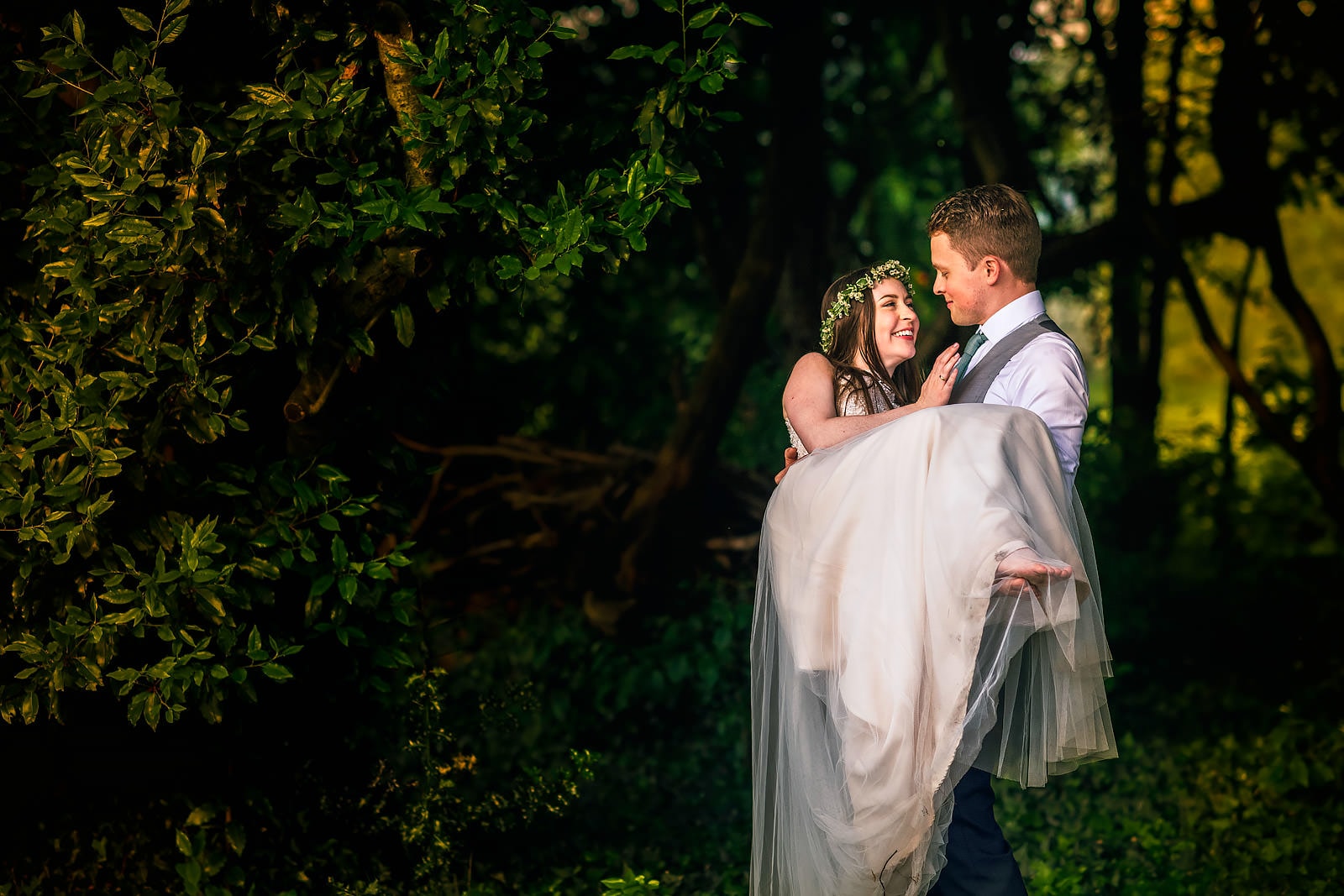 Newly weds sharing a lovely moment at their Cotswolds wedding