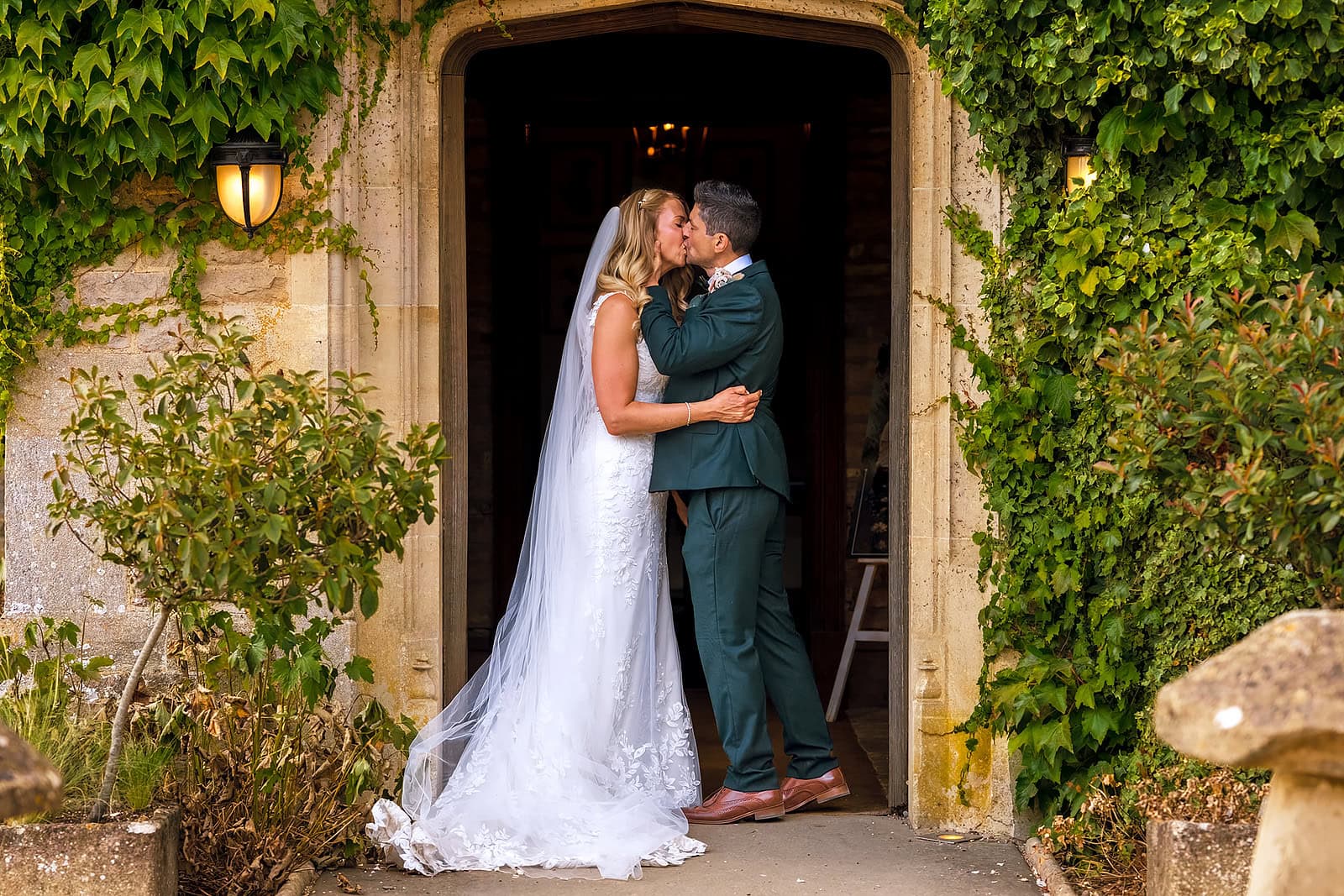 Bride and Groom kiss at Hyde House